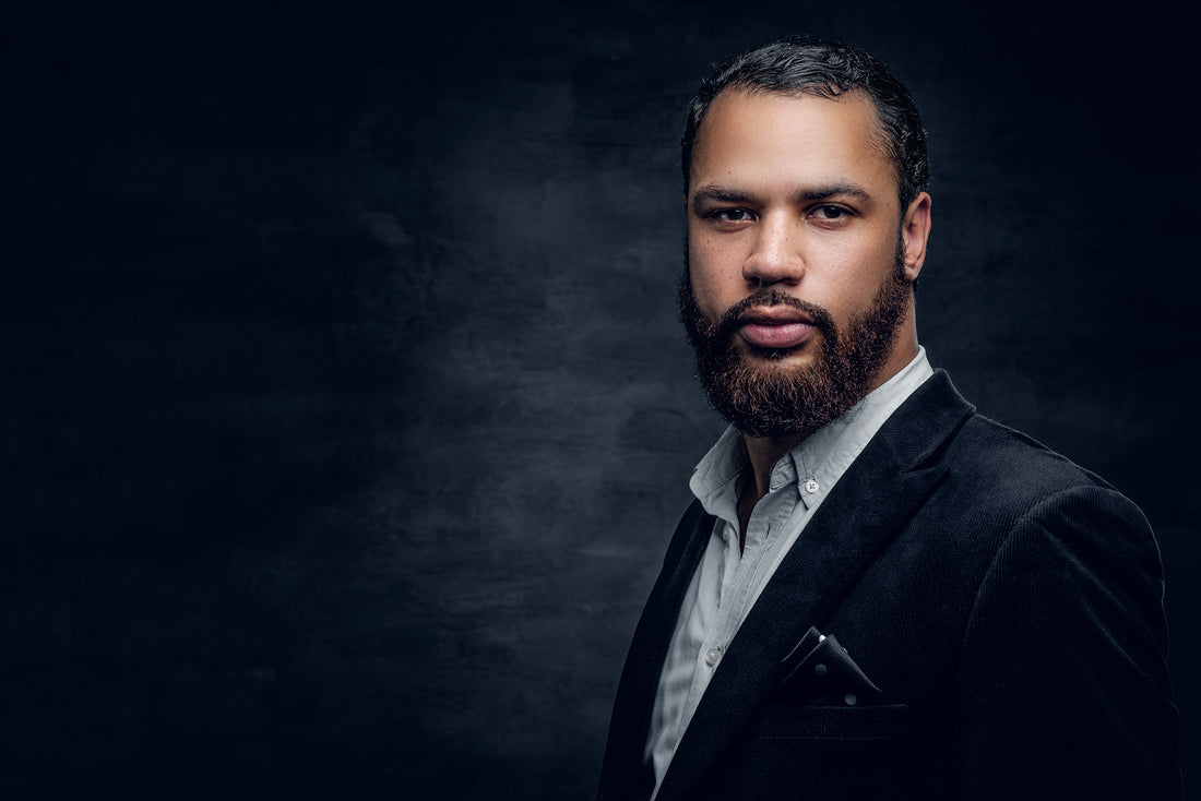 Handsome man with beard wearing a suit